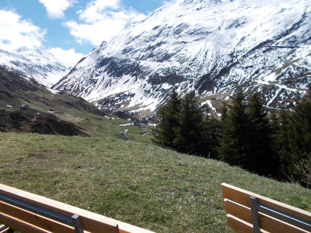 A scenic photograph of a Swiss mountain valley on the Andermatt side of the Oberalp Pass road