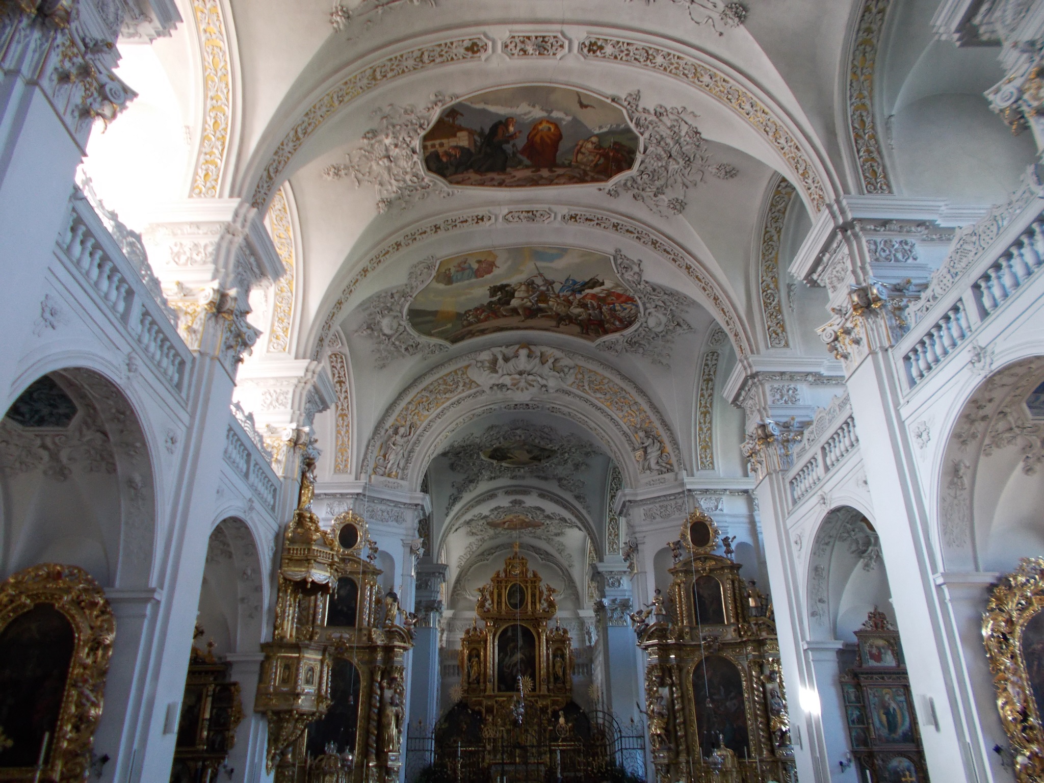 Wide shot of the beautiful paintings on the ceiling of the Disentis Abbey.
