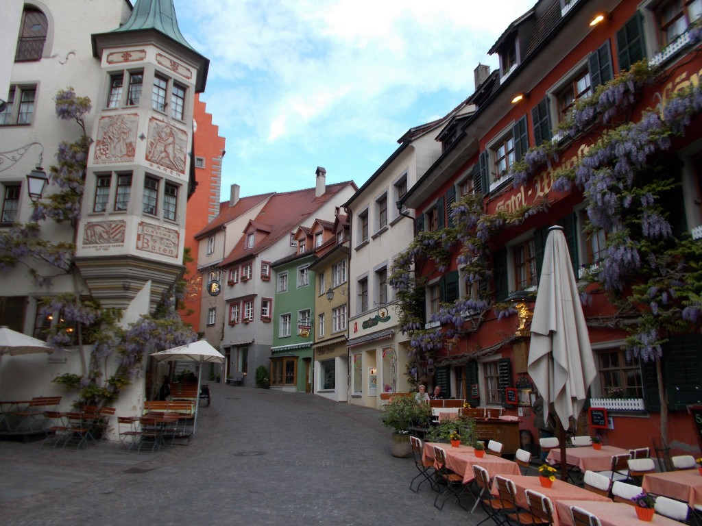 Colorful buildings lining a quiet pedestrian street in Meersburg, Germany.